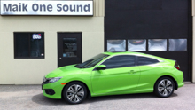 Green 2016 Honda Civic Turbo with premium dark window tint